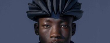 man with inflatable folding bike helmet